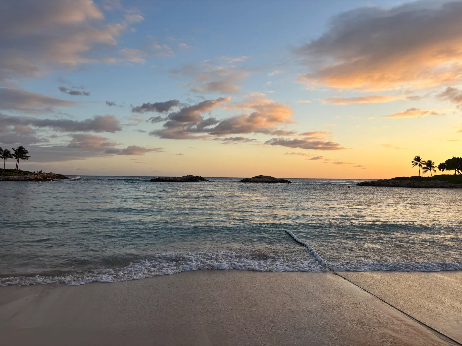 Calm beach at sunset
